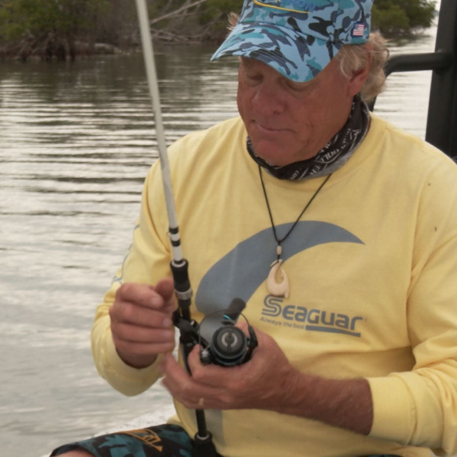 Person Rigging Rod Rigging a New Rod and Reel | Seaguar